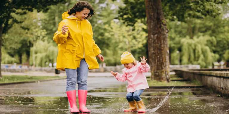 Womens with kids in rainy day